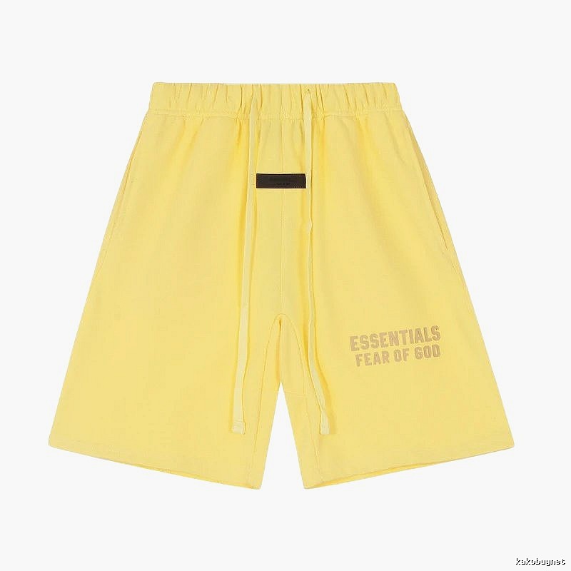 ESSENTIALS minimalist style yellow shorts
