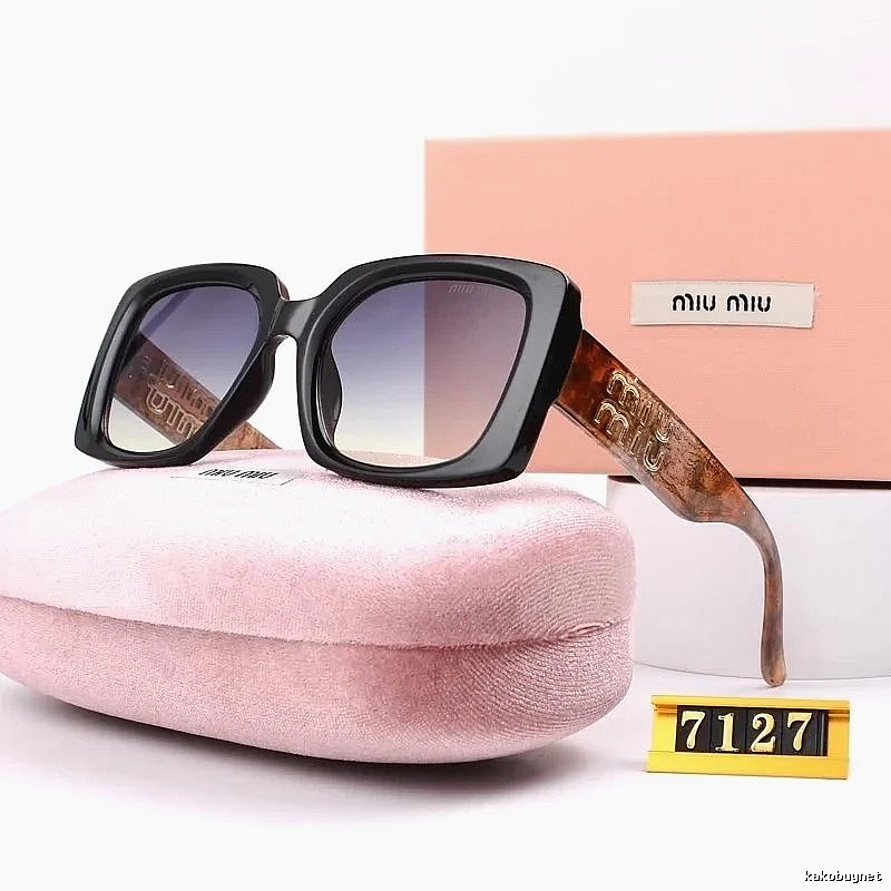 Miu Miu Gift Ready Oversized sunglasses Black Oval Sunglasses with Standout Detail